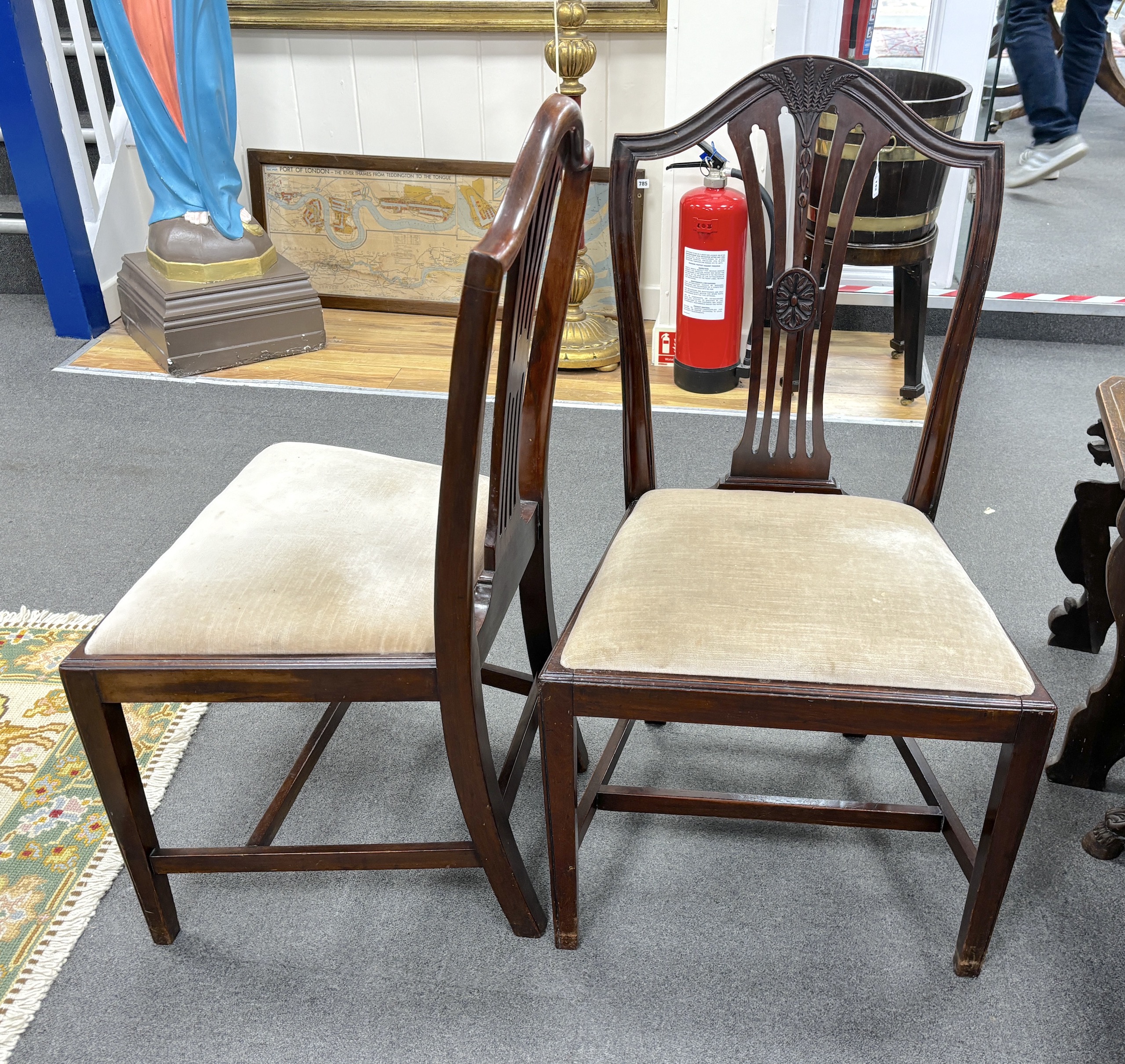 A set of six Hepplewhite style mahogany dining chairs, all singles